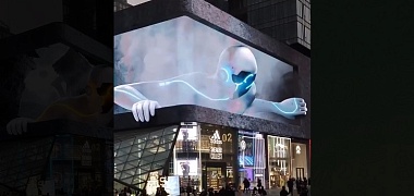 На здании в одном из японских городов появилась огромная 3D-реклама искусственного интеллекта